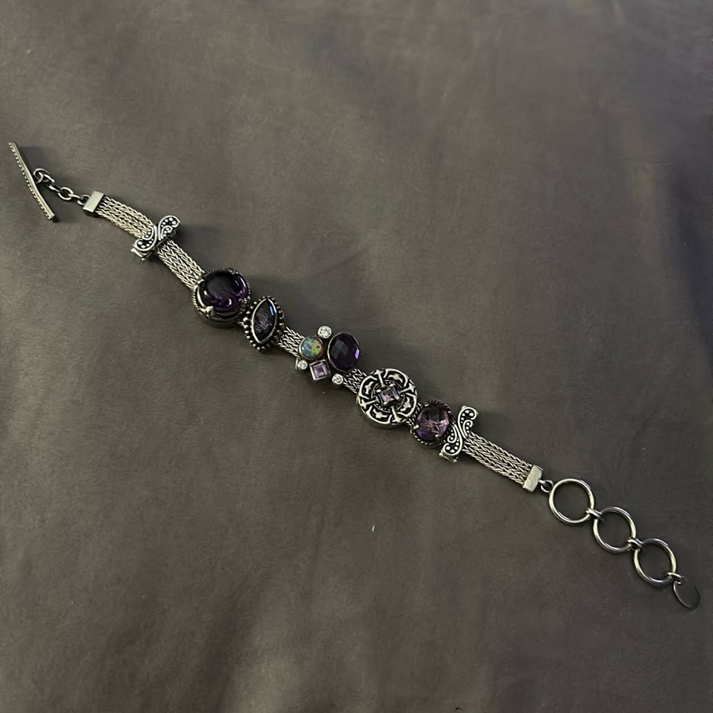 Lori Bonn silver bracelet with purple slides and stoppers